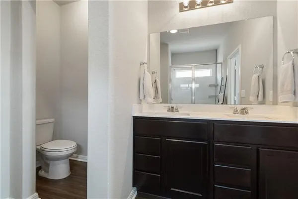 a bathroom with a sink and a toilet