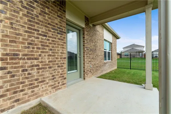 a view of a door with a backyard