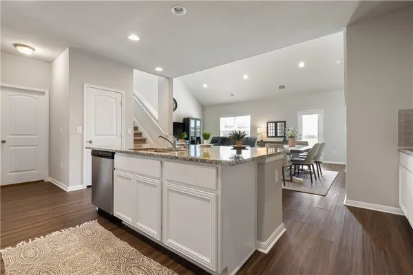 a kitchen with counter top space and sink