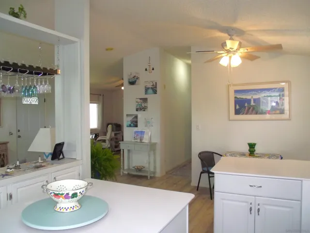 a view of a two chairs in the balcony