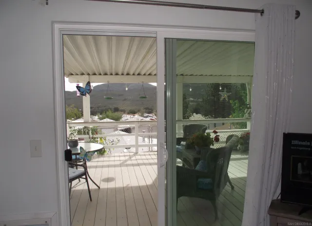 a bathroom with a shower and a toilet