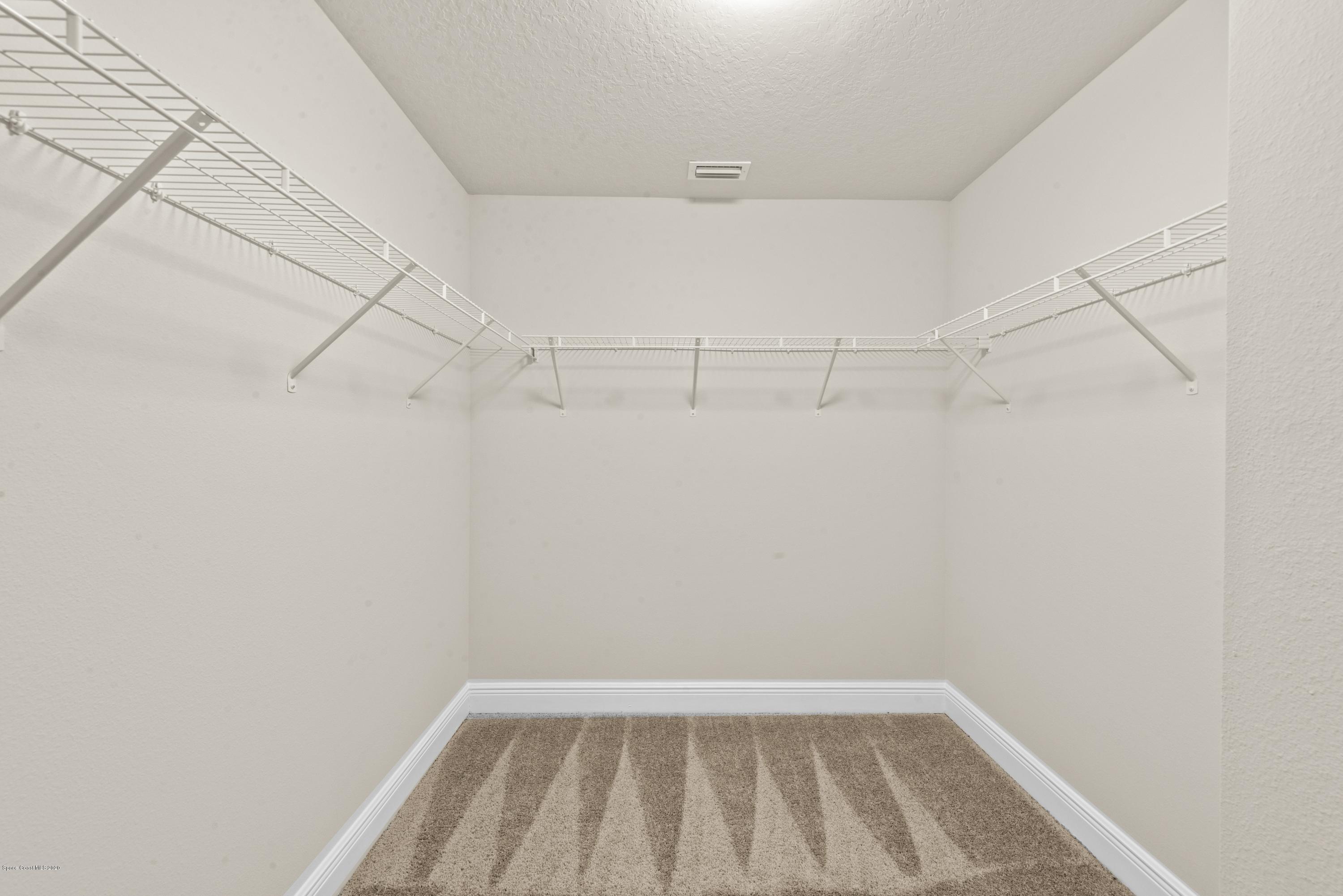 1475 Wakefield Road Southeast Palm Bay, FL 32909 - Photo 23 of 52 Master Closet - sample