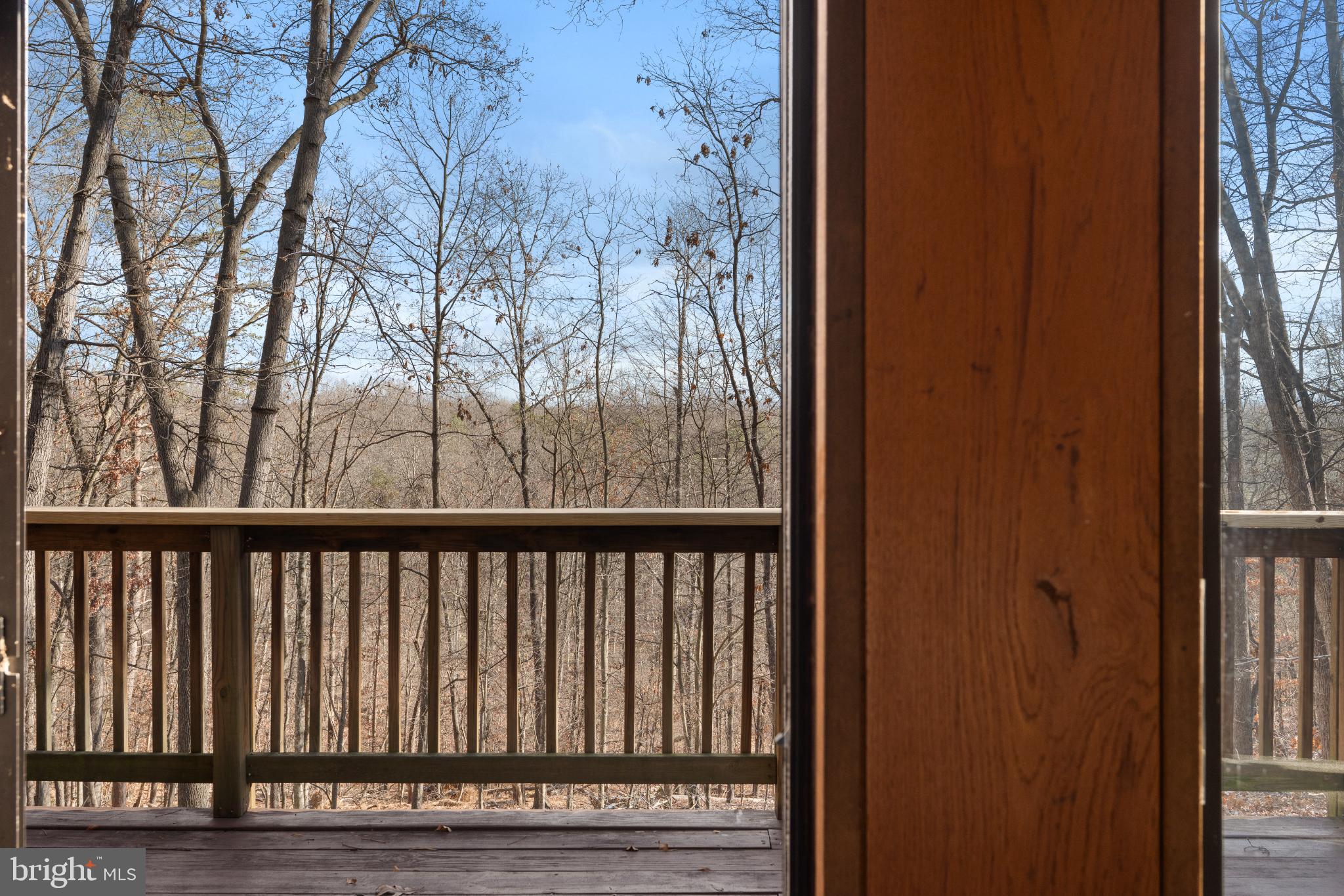 277 Endless Summer Road Hedgesville, WV 25427 - Photo 12 of 33 a view of a balcony with wooden floor