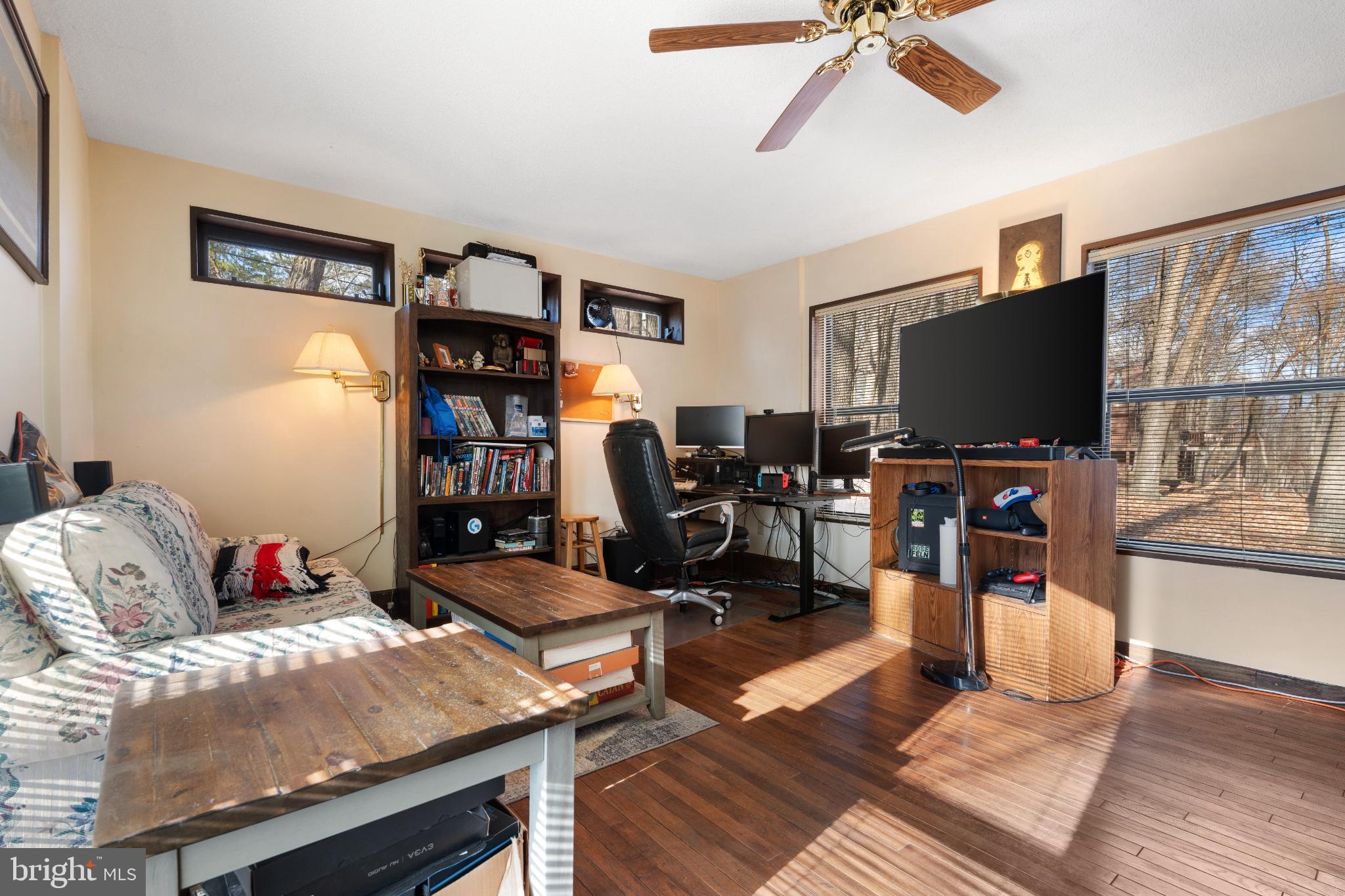 277 Endless Summer Road Hedgesville, WV 25427 - Photo 18 of 33 a bedroom with furniture and a flat screen tv