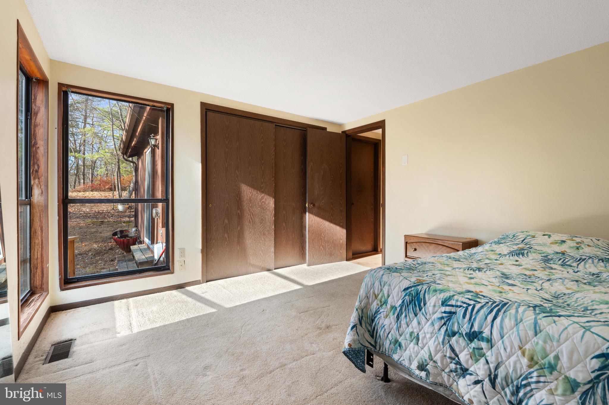 277 Endless Summer Road Hedgesville, WV 25427 - Photo 21 of 33 a bedroom with a bed and a painting on the wall