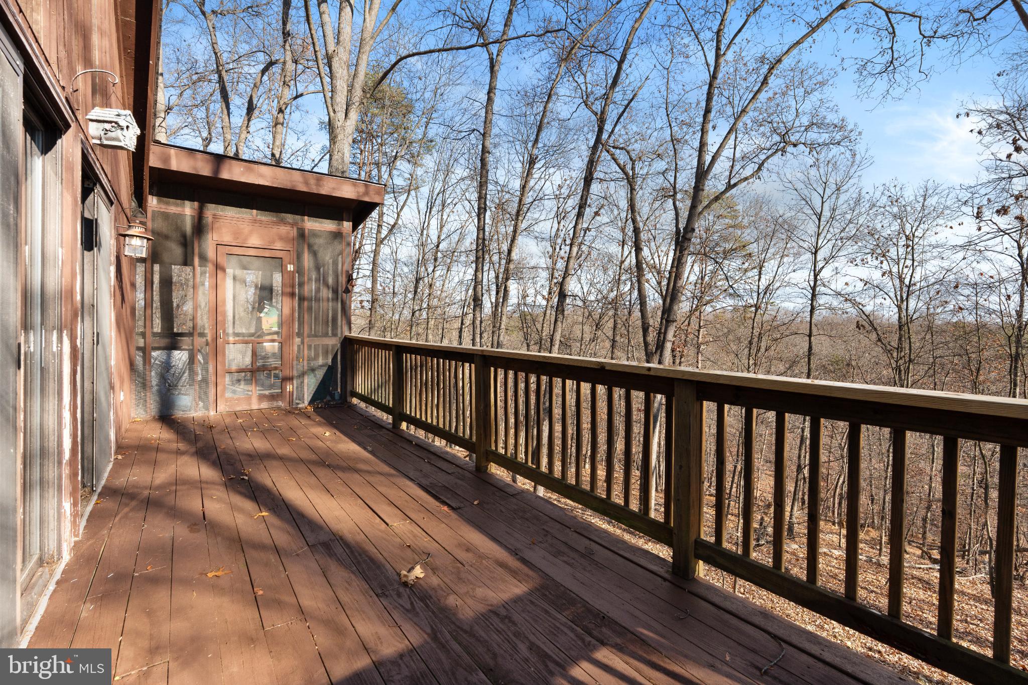277 Endless Summer Road Hedgesville, WV 25427 - Photo 31 of 33 a view of a balcony with wooden floor and fence