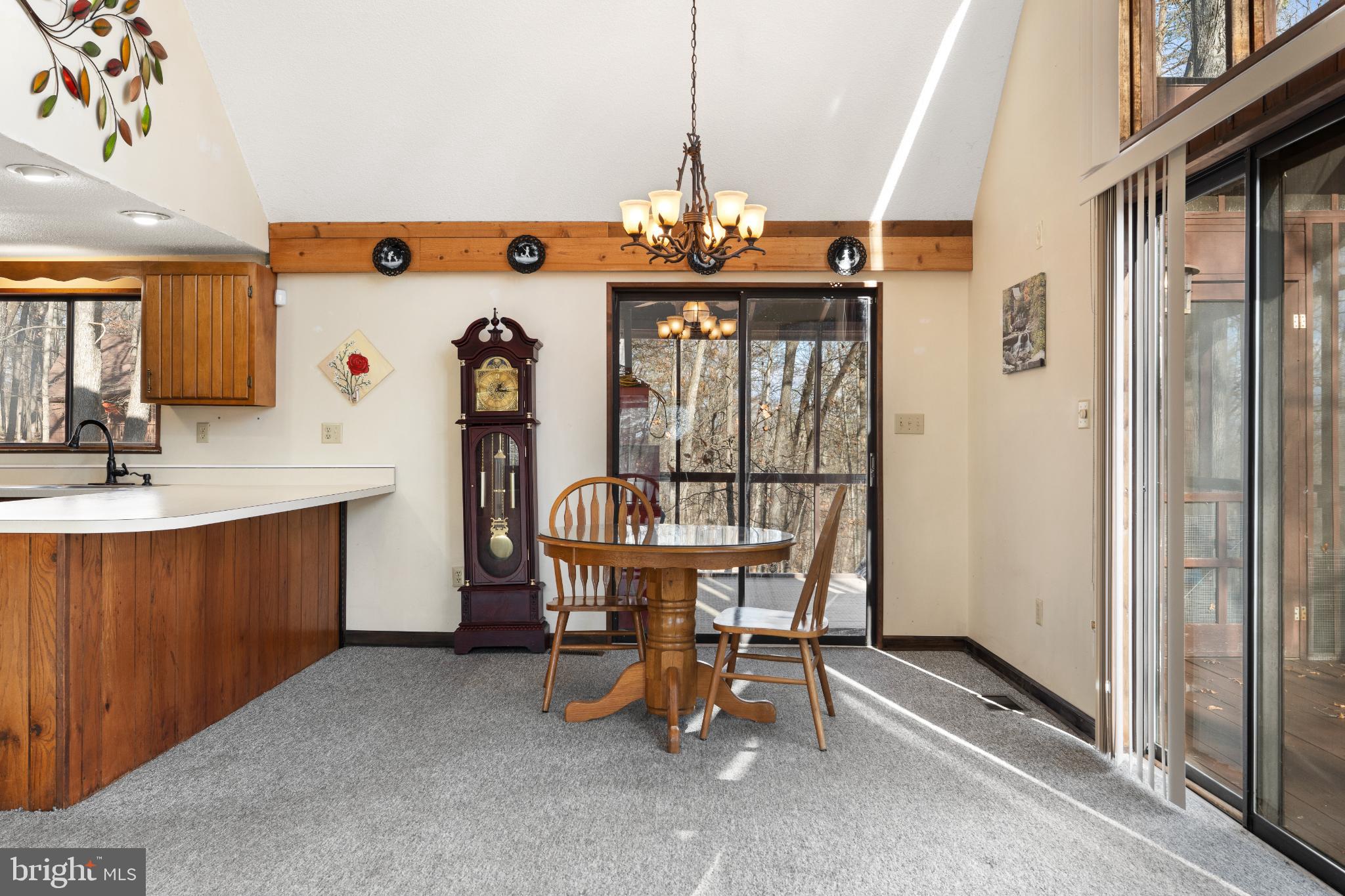 277 Endless Summer Road Hedgesville, WV 25427 - Photo 10 of 33 a view of a dining room with furniture window and outside view