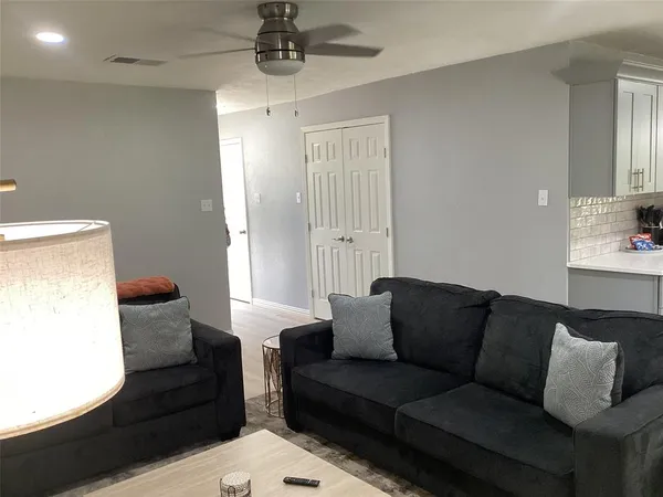a living room with furniture and a couch