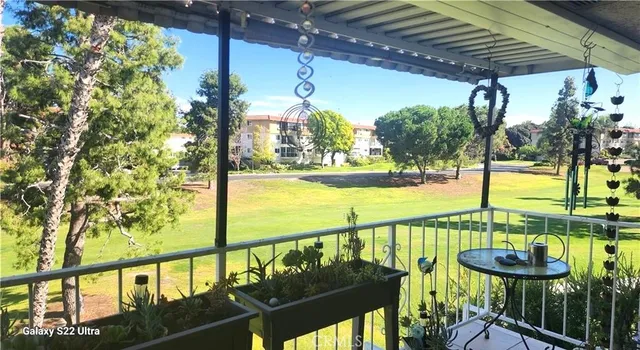 a view of swimming pool from a balcony