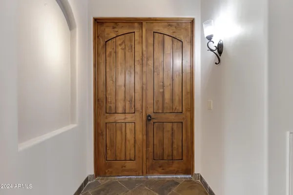 a bathroom with a shower a toilet and a sink