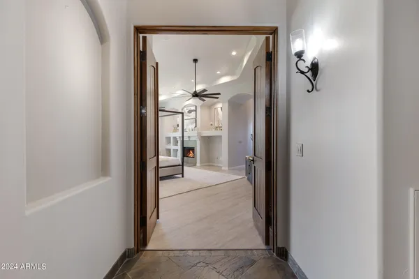 a bathroom with a double vanity sink mirror and shower