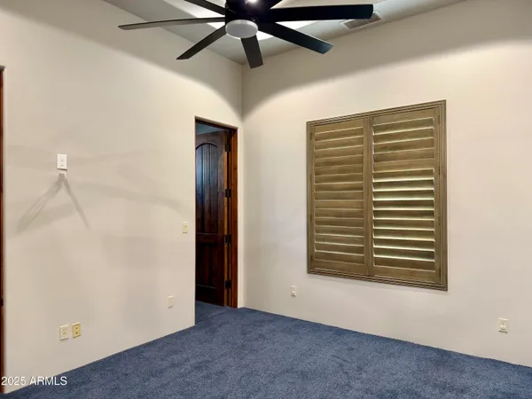 a view of a park with large trees