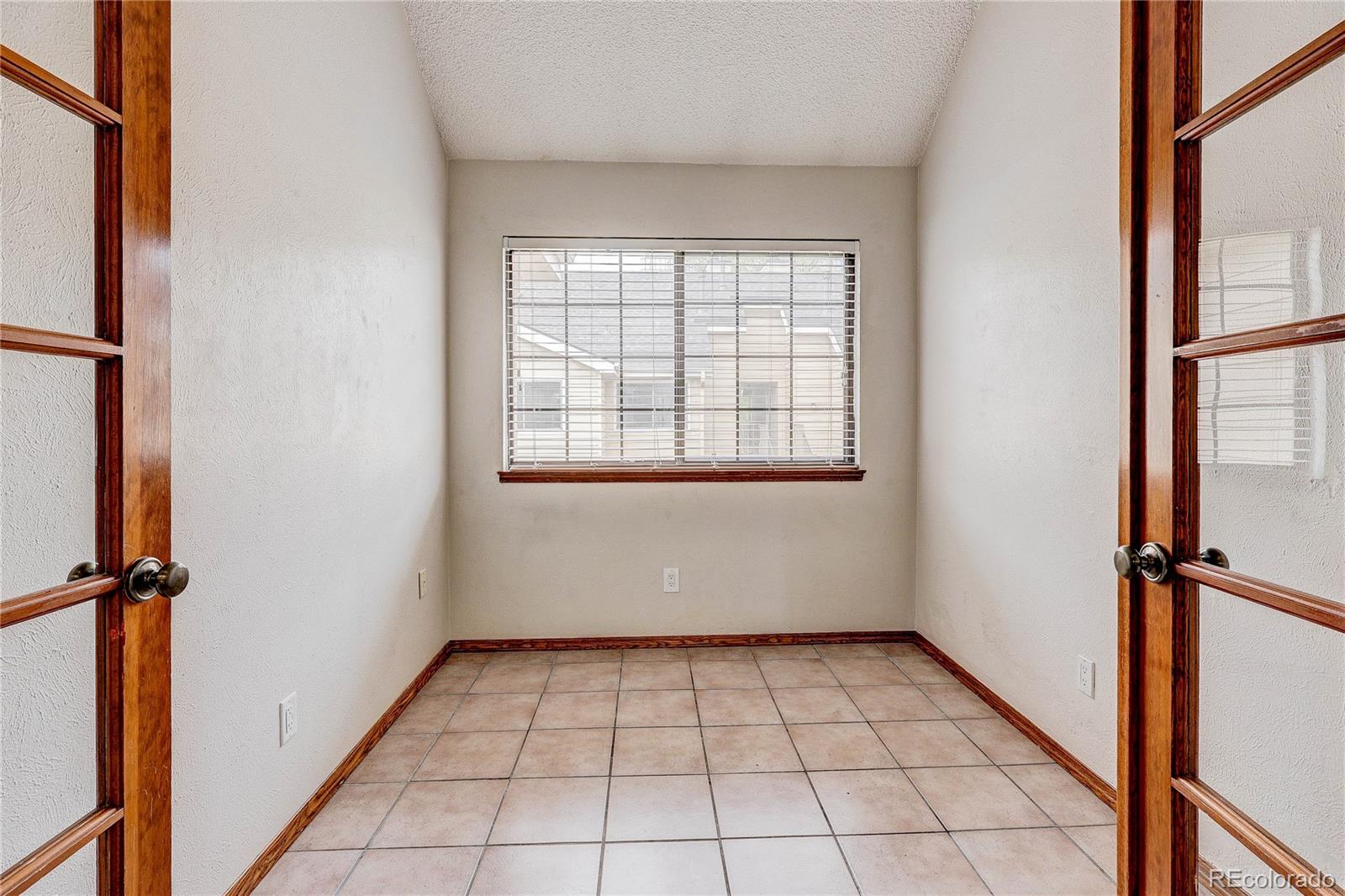 4824 East Kentucky Avenue, Unit C Denver, CO 80246 - Photo 13 of 17 an empty room with windows