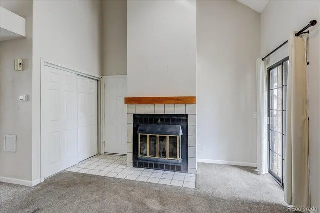 a living room with fireplace