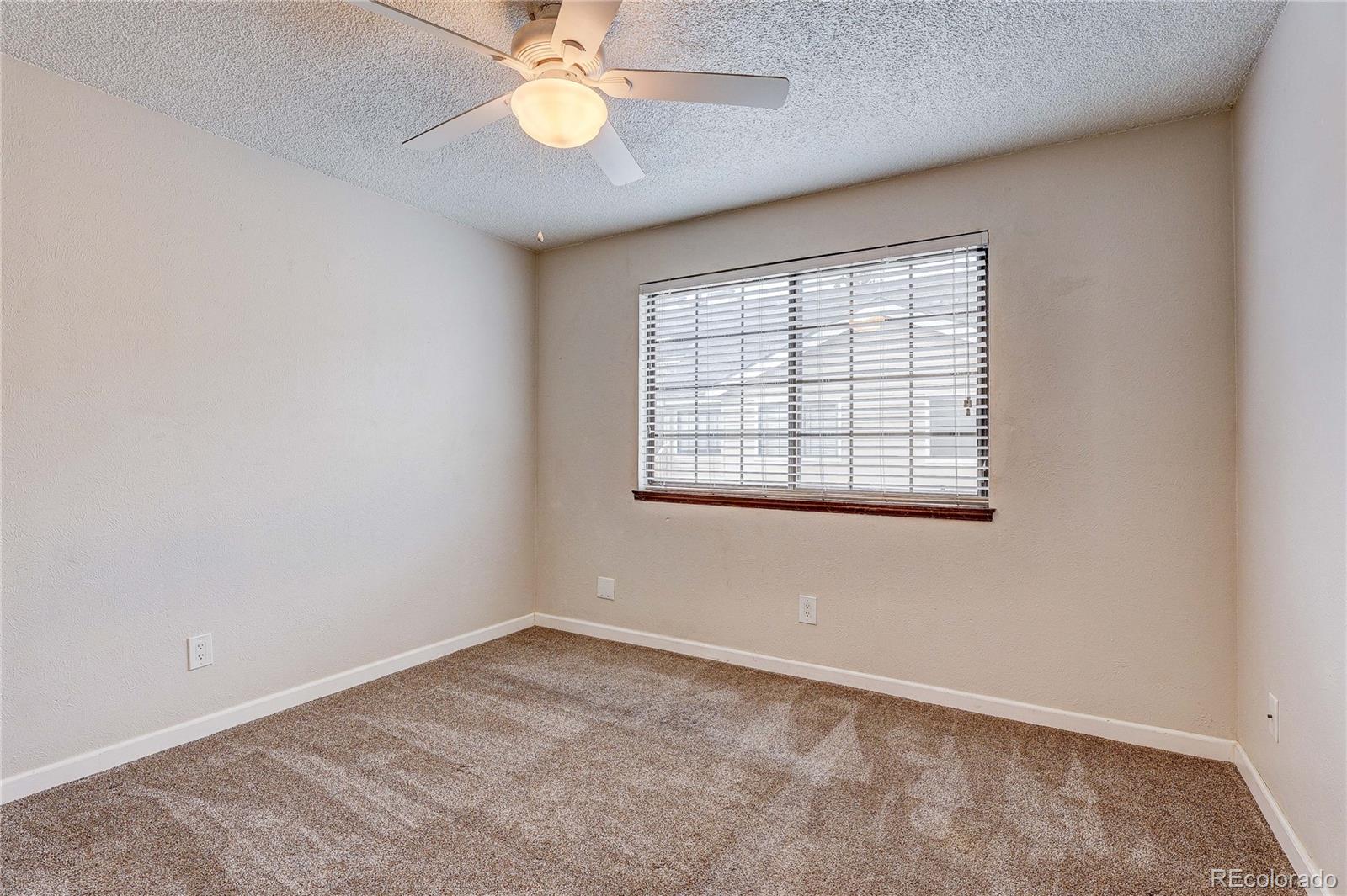 4824 East Kentucky Avenue, Unit C Denver, CO 80246 - Photo 10 of 17 an empty room with a window
