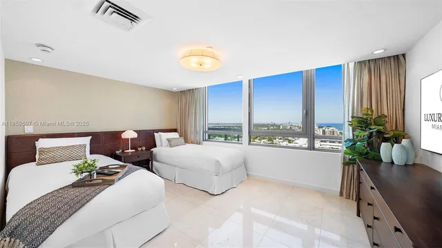 a bathroom with a sink vanity and a mirror