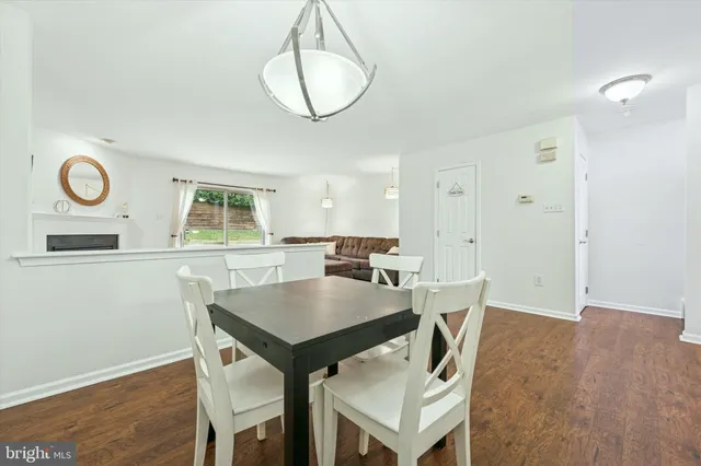 a bedroom with a fireplace and a television