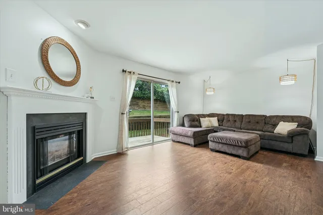 a close view of a fireplace with wooden floor