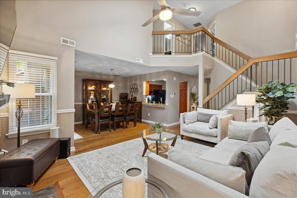 52 Kettlebrook Drive Mount Laurel, NJ 08054 - Photo 10 of 28 Living room opens to dining w/chair rail detailing
