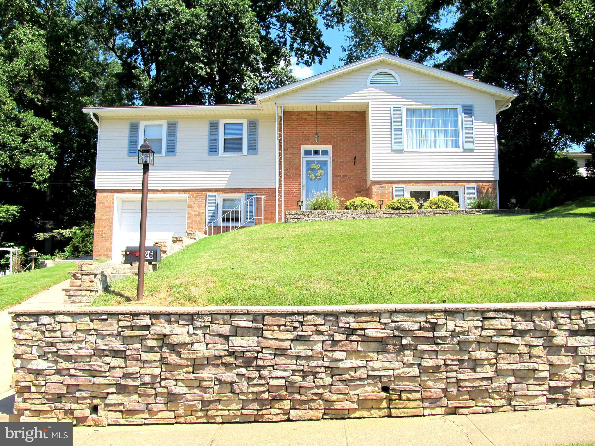 126 Kingbrook Road Linthicum, MD 21090 - Photo 1 of 23 a front view of a house with a yard