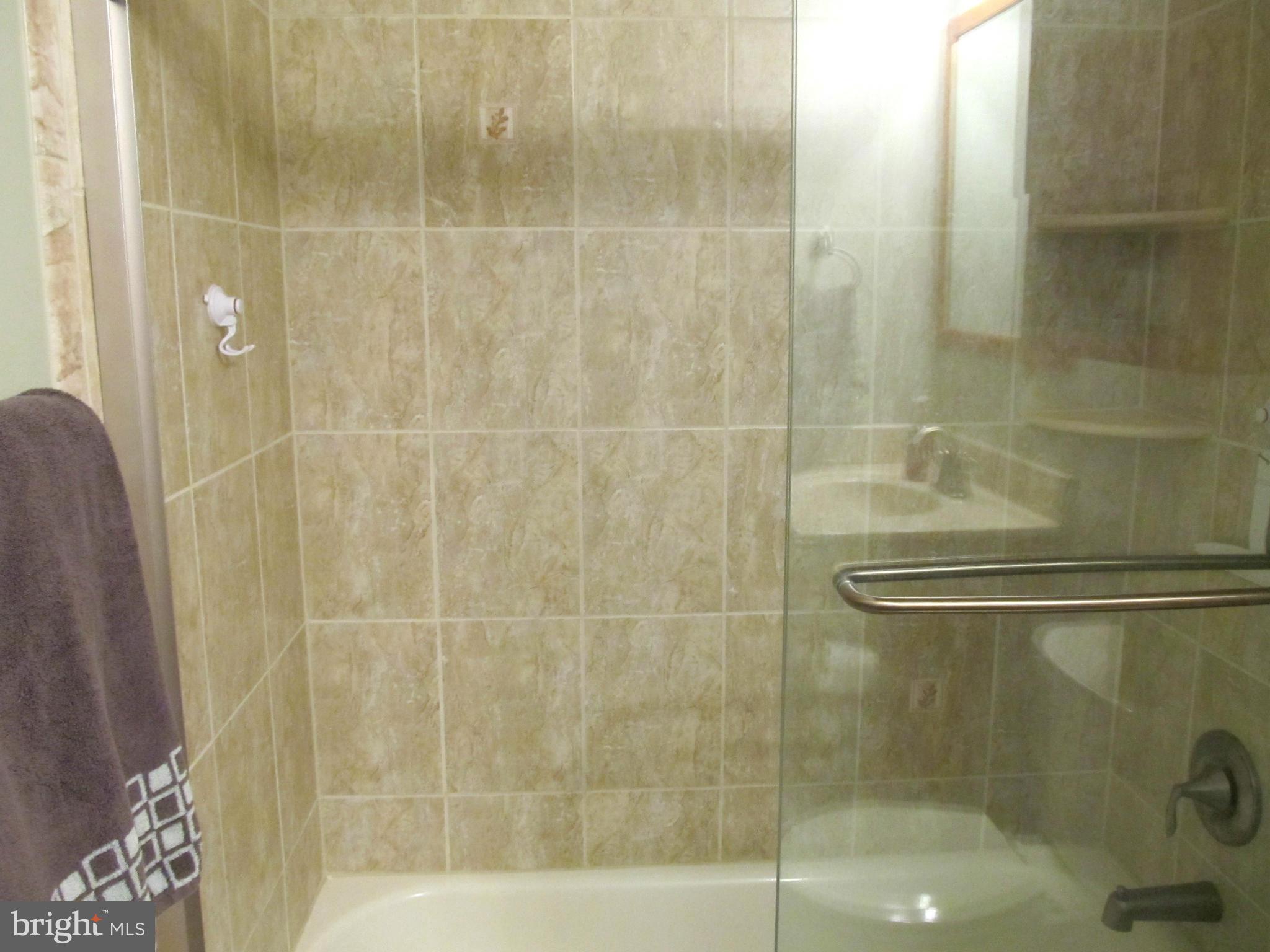 126 Kingbrook Road Linthicum, MD 21090 - Photo 15 of 23 a bathroom with a shower