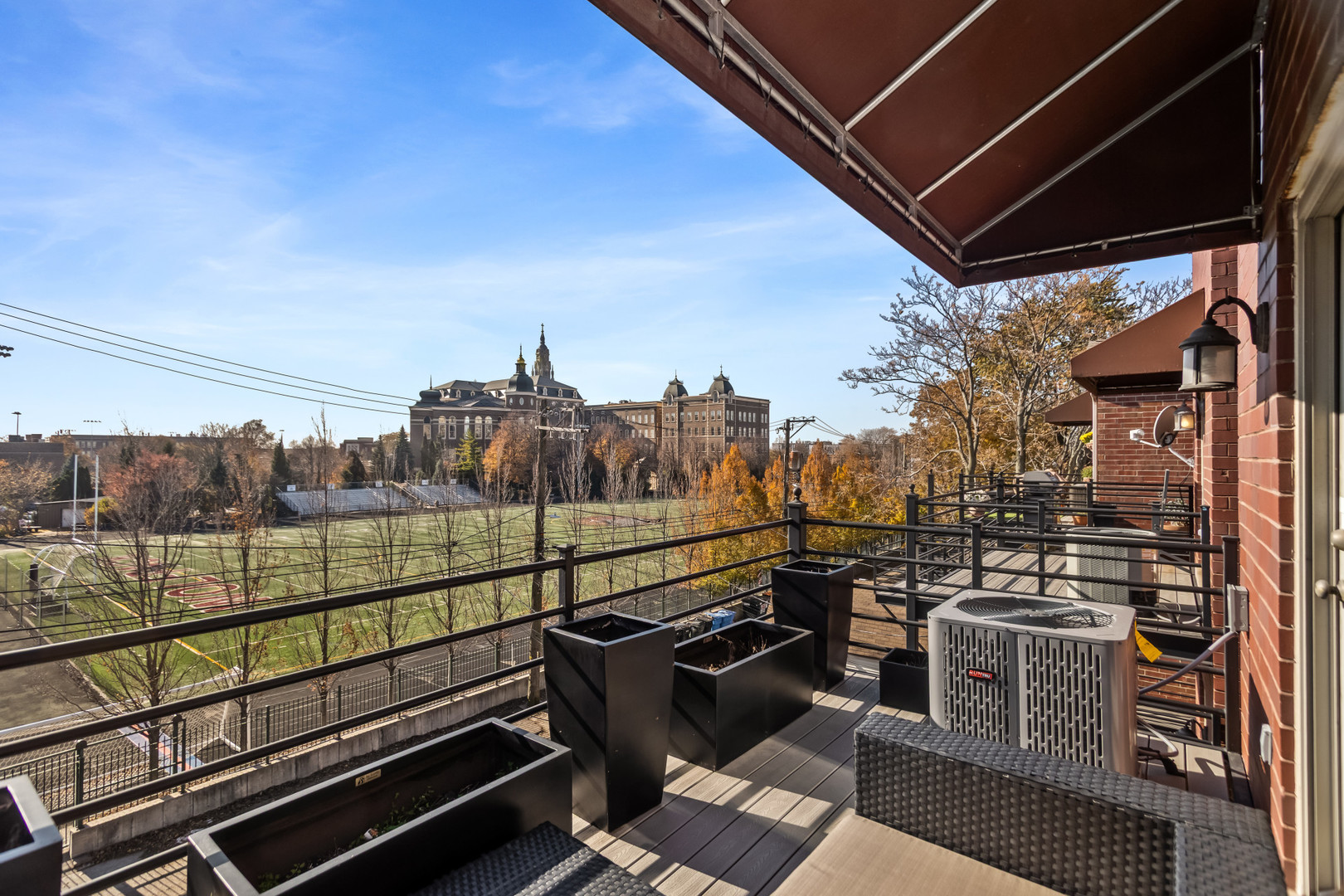 1033 West Taylor Street, Unit 3E Chicago, IL 60607 - Photo 16 of 22 a view of a balcony with wooden floor