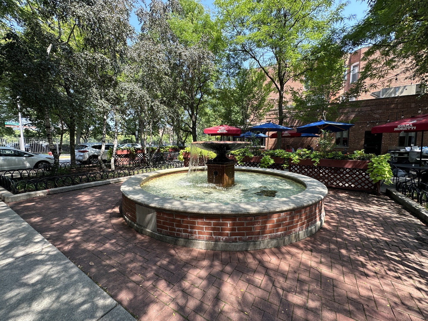 1033 West Taylor Street, Unit 3E Chicago, IL 60607 - Photo 21 of 22 a water fountain is sitting in the middle of a yard