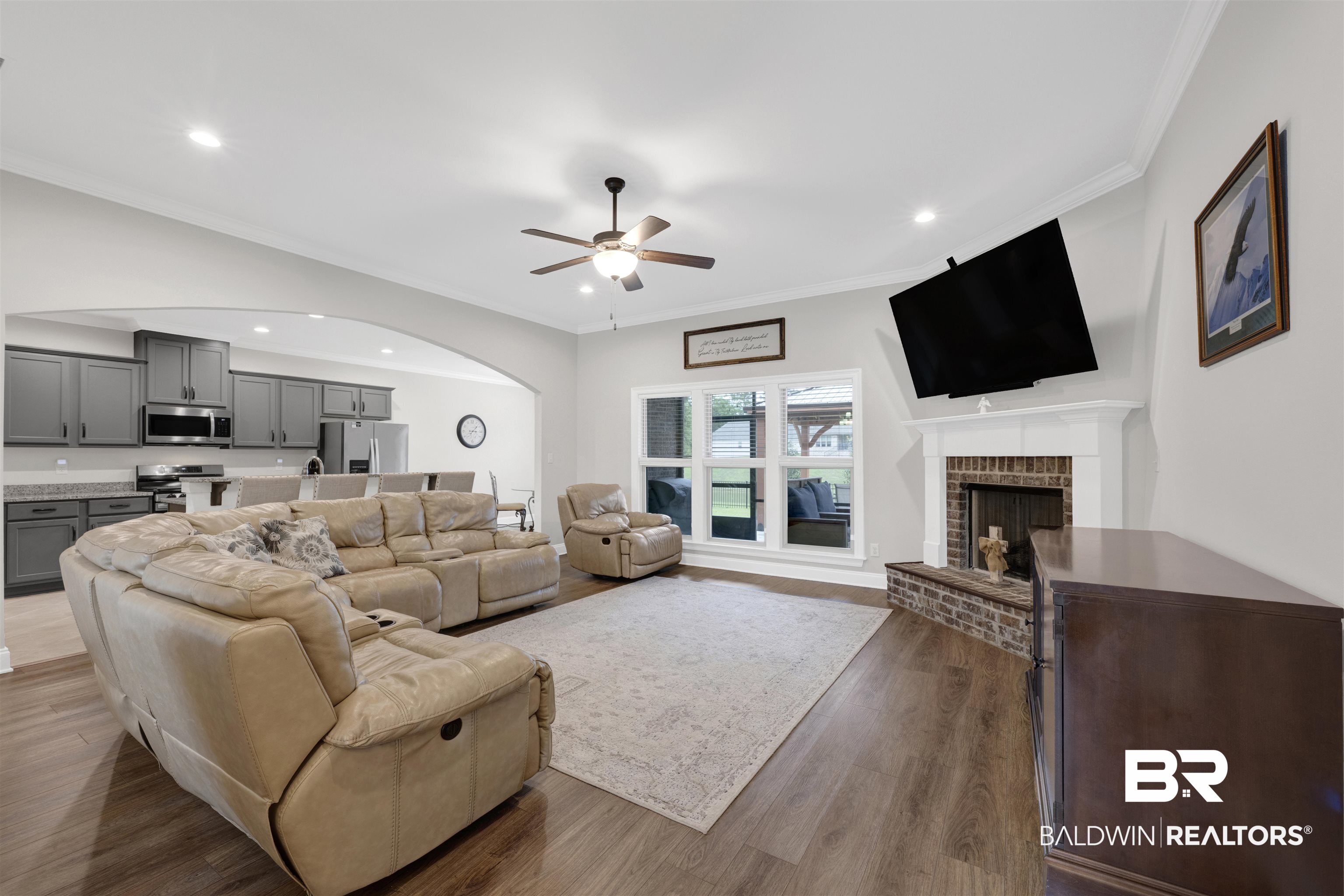12672 Squirrel Drive Daphne, AL 36527 - Photo 9 of 49 Spacious living area featuring wood-finish flooring, a ceiling fan, and recessed lighting