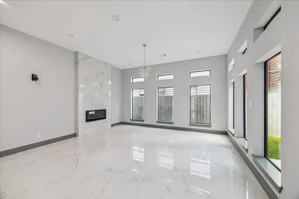 a large kitchen with cabinets and stainless steel appliances