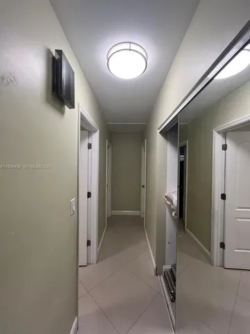 a view of a house and a yard