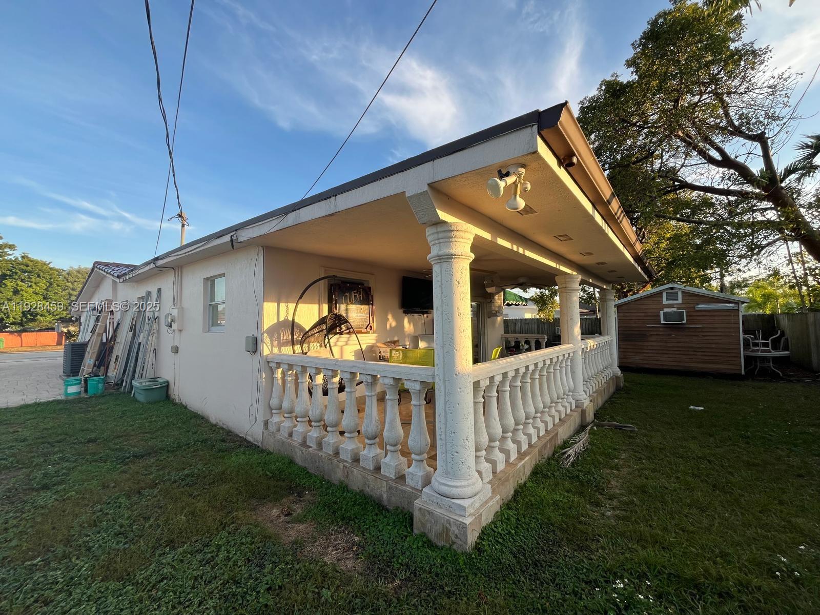 3520 Southwest 104th Avenue Miami, FL 33165 - Photo 26 of 38 a view of porch with garden