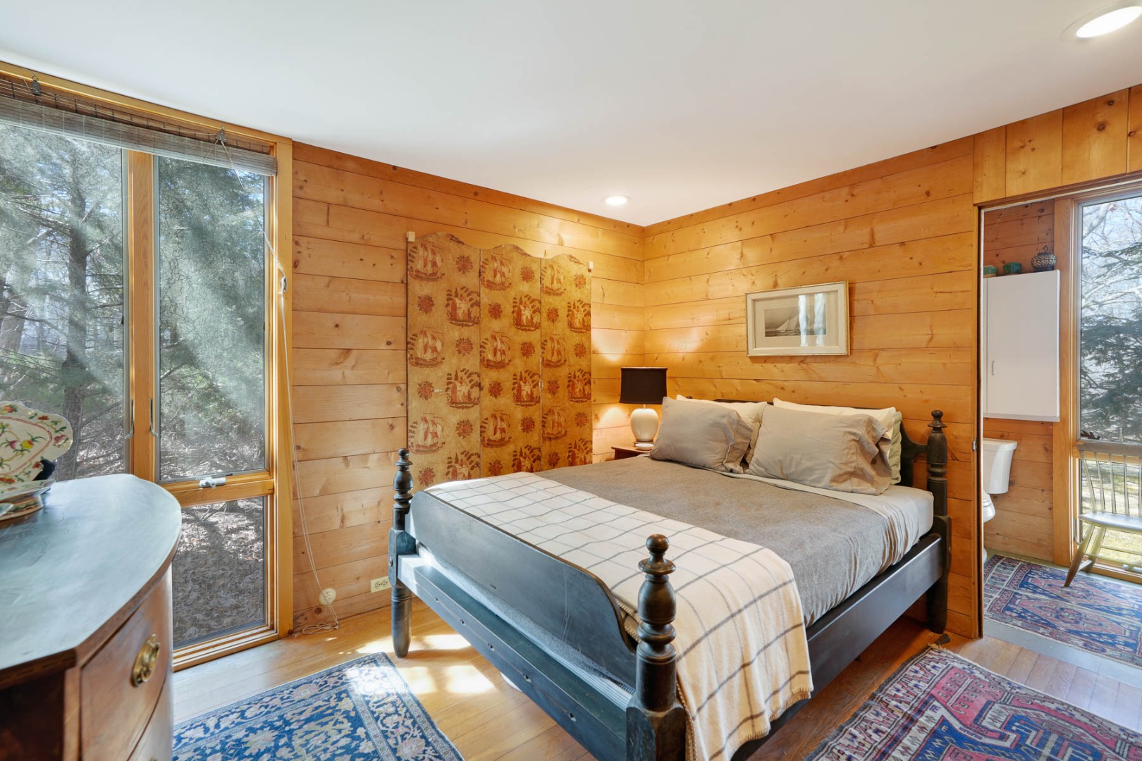 25 Fulling Mill Road Chilmark, MA 02535 - Photo 13 of 31 a bedroom with a bed and wooden floor