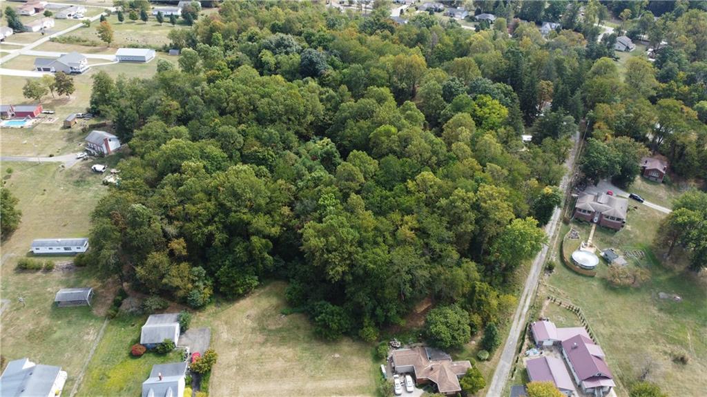 222 Hopwood Coolspring Road Hopwood, PA 15445 - Photo 8 of 12 an aerial view of a house with a yard