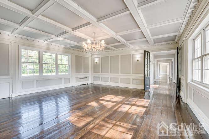 55 Devon Road, Unit B Colonia, NJ 07067 - Photo 16 of 53 a view of an entryway with wooden floor