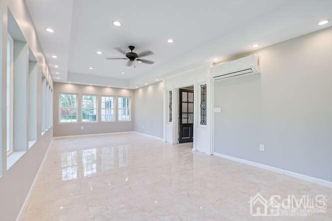 55 Devon Road, Unit B Colonia, NJ 07067 - Photo 22 of 53 a view of an empty room with a window