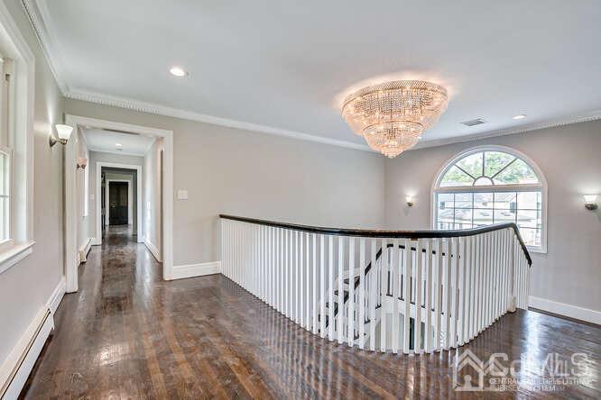 55 Devon Road, Unit B Colonia, NJ 07067 - Photo 36 of 53 a view of entryway and hall with wooden floor
