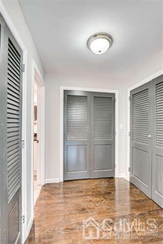 55 Devon Road, Unit B Colonia, NJ 07067 - Photo 41 of 53 an empty room with wooden floor and closet