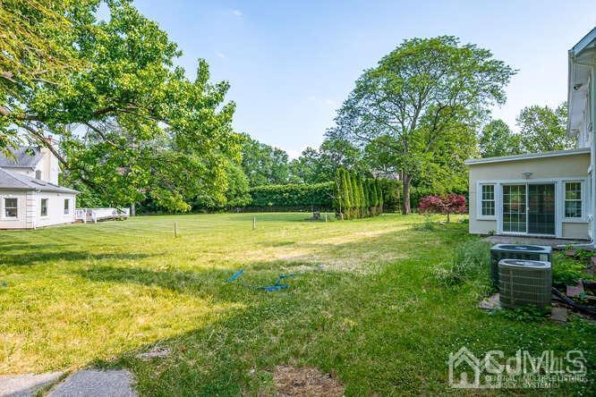 55 Devon Road, Unit B Colonia, NJ 07067 - Photo 51 of 53 a view of a house with a backyard