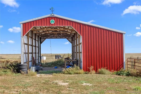a view of a back yard of the house