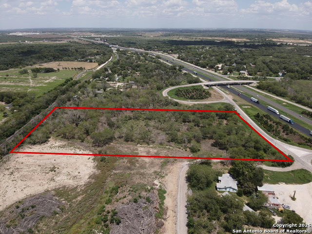 13901 Interstate 35 Access Road Von Ormy, TX 78073 - Photo 2 of 4 a view of a city with an ocean