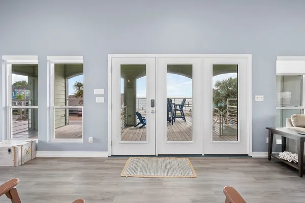 a view of livingroom with furniture and floor to ceiling window