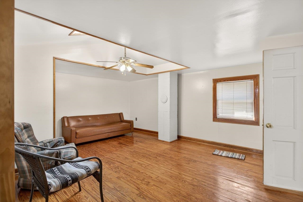 10677 Allman Road Dayton, VA 22821 - Photo 15 of 57 a bedroom with furniture and wooden floor