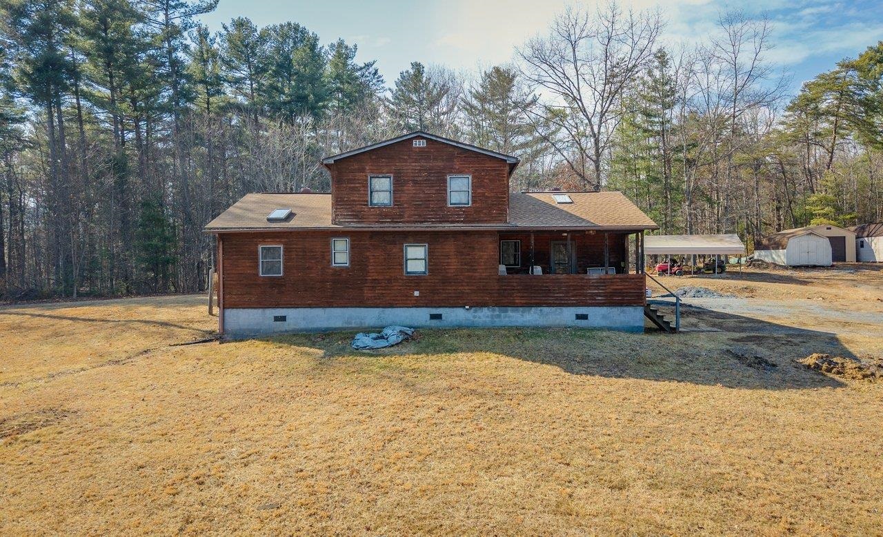 10677 Allman Road Dayton, VA 22821 - Photo 2 of 57 a front view of a house with a yard