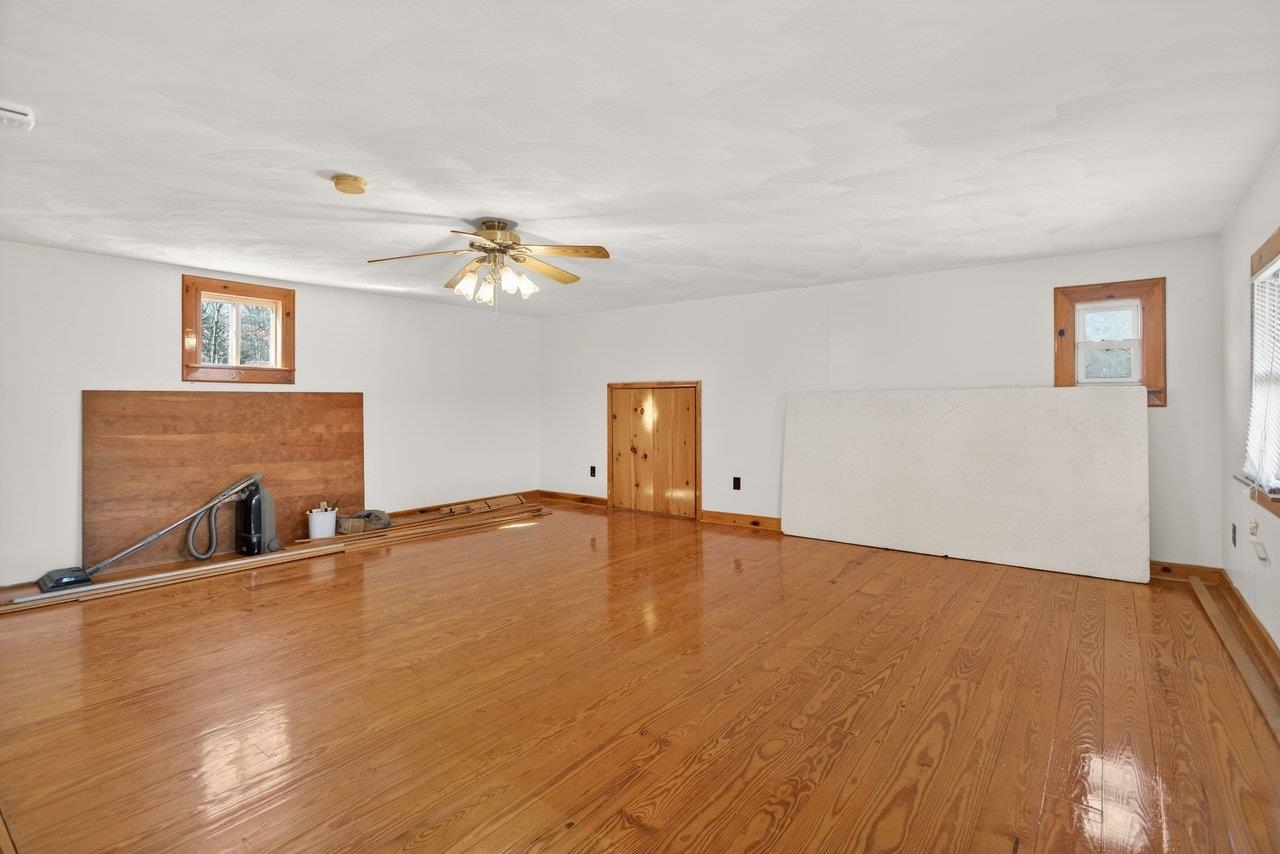 10677 Allman Road Dayton, VA 22821 - Photo 27 of 57 wooden floor in an empty room with a window
