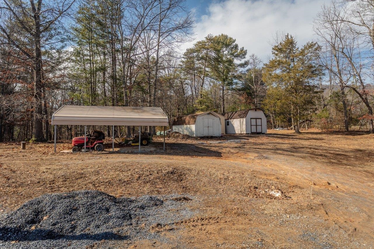 10677 Allman Road Dayton, VA 22821 - Photo 33 of 57 a view of a house with yard and sitting area