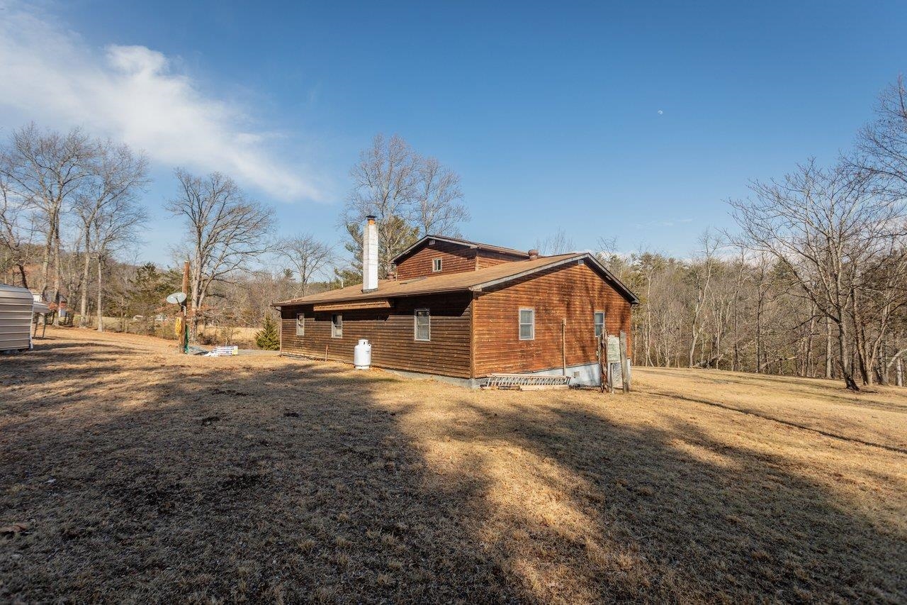 10677 Allman Road Dayton, VA 22821 - Photo 39 of 57 a view of a house with a yard