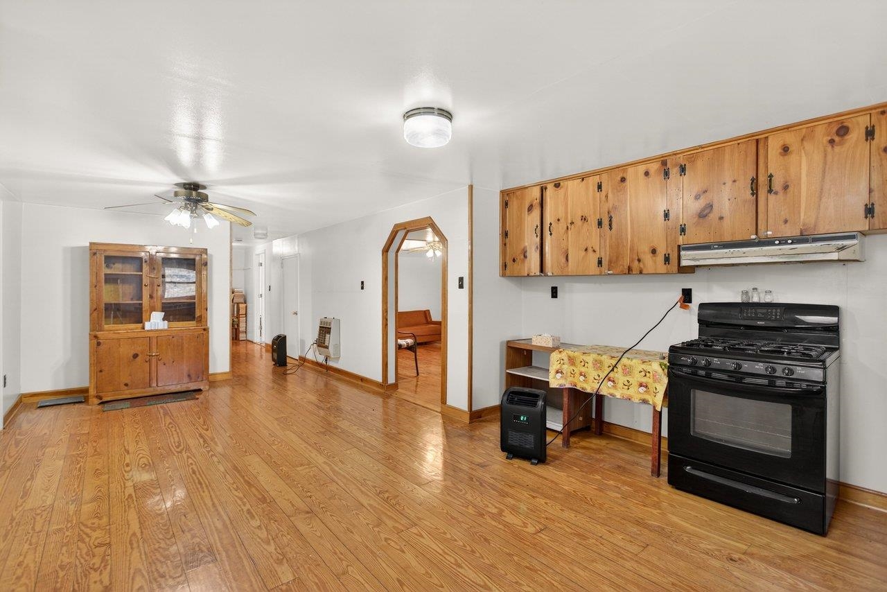 10677 Allman Road Dayton, VA 22821 - Photo 8 of 57 a living room with furniture and a fireplace