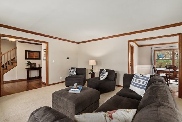 982 Plum Tree Road Fox River Grove, IL 60021 - Photo 15 of 48 a living room with furniture and wooden floor