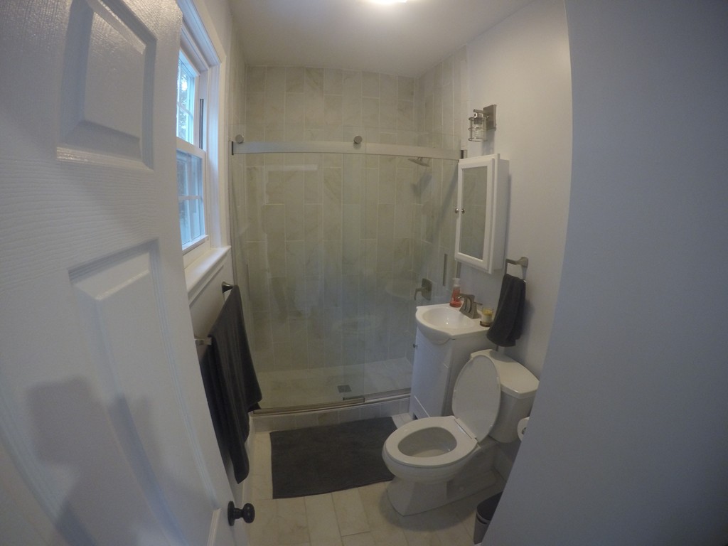 18 Park Street Boston, MA 02136 - Photo 5 of 20 a bathroom with a sink and toilet
