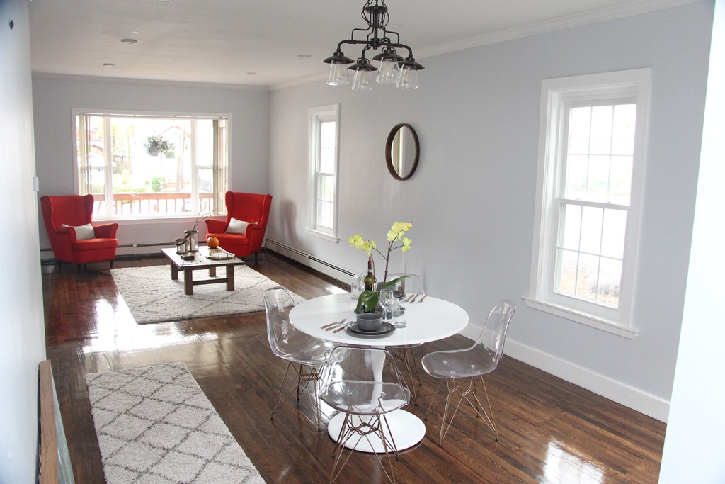 18 Park Street Boston, MA 02136 - Photo 6 of 20 a living room with dining table furniture and a window